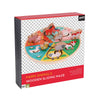 The Petit Collage Farm Animals Wooden Sliding Maze is a round board toy with colorful animal pieces, recommended for ages 12 months and up.