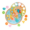 The Petit Collage Multi-Language + Counting + Colors Wooden Learning Clock features colorful shapes, numbers, and rotating clock hands for childrens educational play.