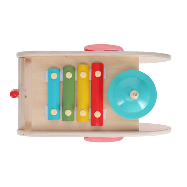 Top view of the Petit Collage Wooden 5-in-1 Elephant Music Toy featuring four colorful xylophone bars and a blue circular cymbal.