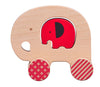 The Petit Collage Wooden Push Along Elephant Toy features a large natural-colored elephant with a removable red elephant piece and two patterned wheels.