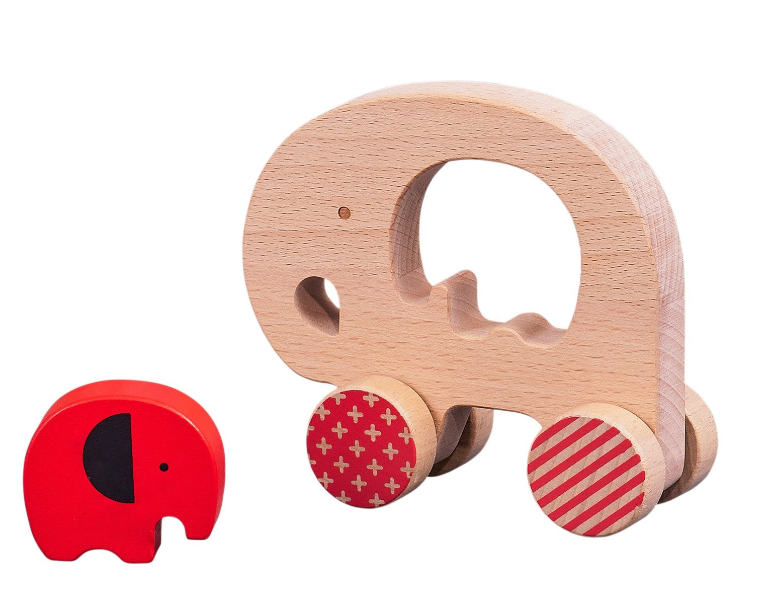 The Petit Collage Wooden Push Along Elephant Toy features wheels and a cut-out, shown beside a smaller red elephant figure with a black ear and painted details.