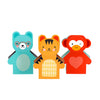 Three colorful, cartoon-style gift boxes from Petit Collage’s Petit Friends Puppet Theatre Set—a blue bear, yellow tiger, and red monkey—stand side by side on a white background.