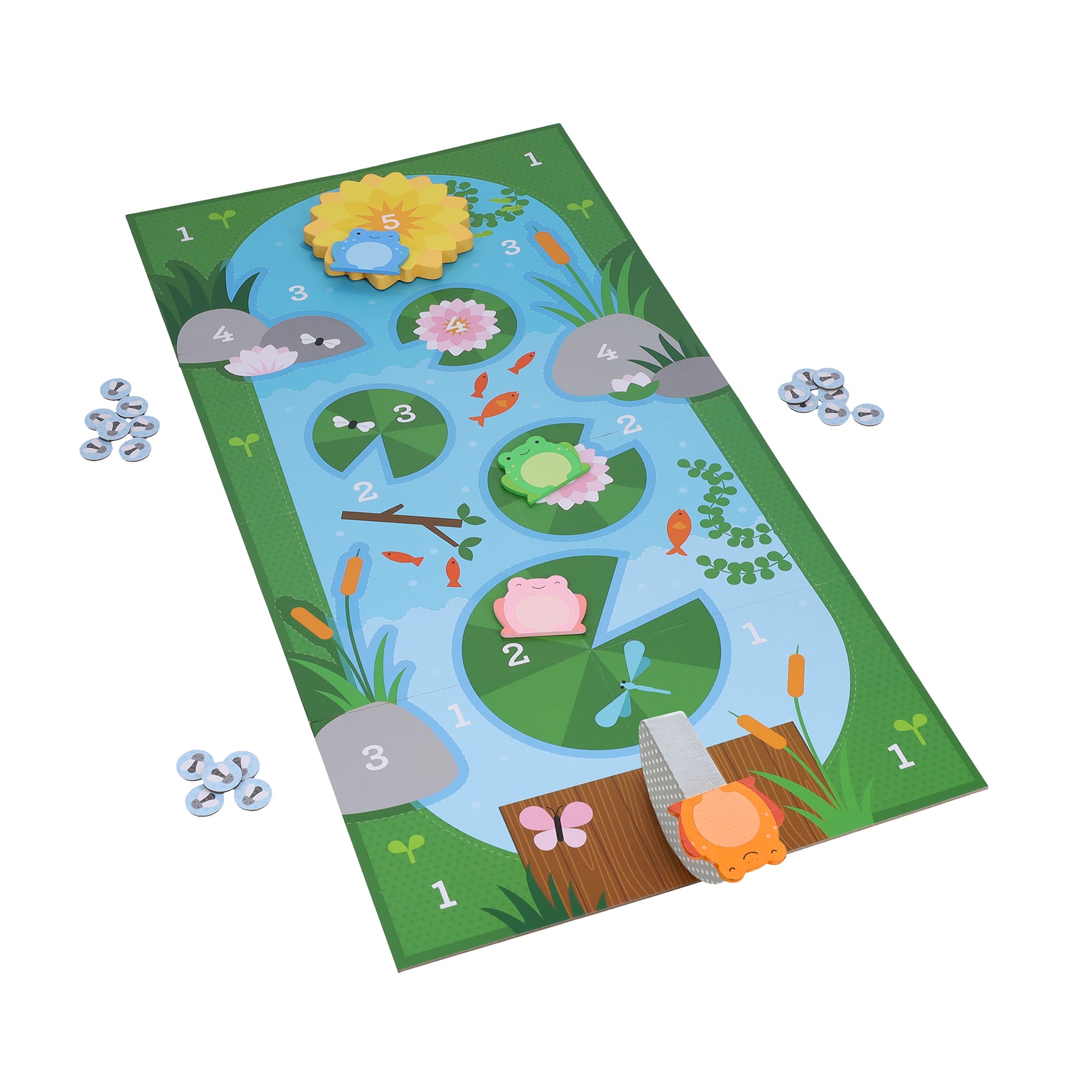 Leaping Frogs! by Petit Collage is a colorful pond-themed board game with lily pads, frogs, turtles, and tokens on a rectangular play mat.