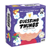 A colorful box for Petit Collage’s “Guessing Things: A What Am I? Game” features a smiling child, a big thought bubble with the game title, and playful images of pizza, silly glasses, and a flower alongside fun questions.