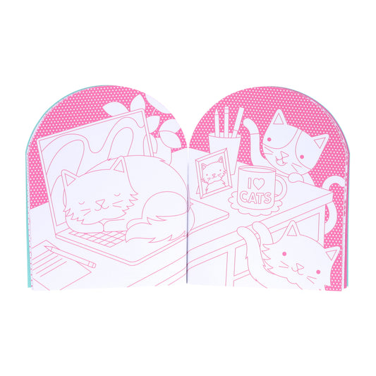 Line drawing from the Petit Collage "Cats Coloring Book + Stickers": three cats in an office—one naps on a laptop, another sits by a mug on a desk, and the third peeks up—all set against a pink background.