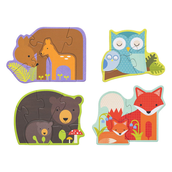 The Forest Babies Beginner Puzzle by Petit Collage includes four colorful animal-themed jigsaws: deer with fawn, owl with bluebird, bear with cub, and two foxes, all displayed on a white background.