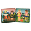 The Petit Collage Little Travelers Magnetic Play Set features two illustrated square trays: one with children camping in the mountains, and the other with kids and animals enjoying a forest picnic.