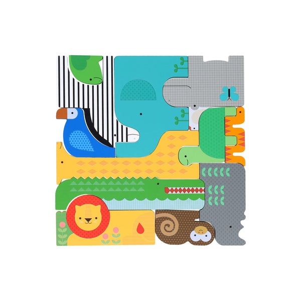 The Petit Collage Wooden Puzzle + Play Shaped Safari Animals features a lion, crocodile, elephant, sloth, toucan, and more vibrant animal pieces arranged on a white background.