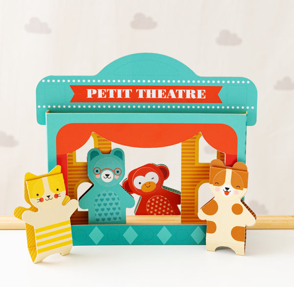 The Petit Collage Petit Friends Puppet Theatre Set features a colorful puppet theater with three animal puppets—a cat, bear, and monkey—displayed in front of and inside the stage.