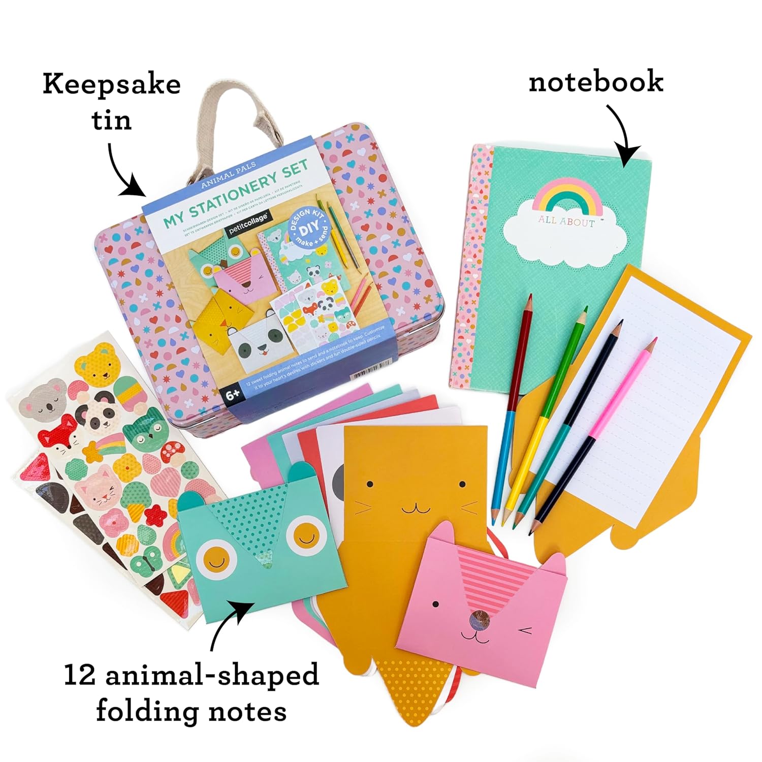 The Animal Pals My Stationery Set by Petit Collage features a keepsake tin, a rainbow notebook, four colored pencils, animal-shaped folding notes, and a sheet of animal stickers.