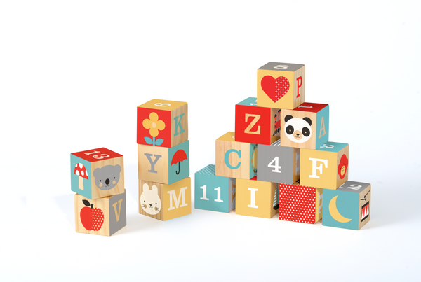 The Petit Collage ABC Wooden Alphabet Blocks is a set of colorful wooden blocks with letters, numbers, animals, and simple illustrations arranged on a white background.