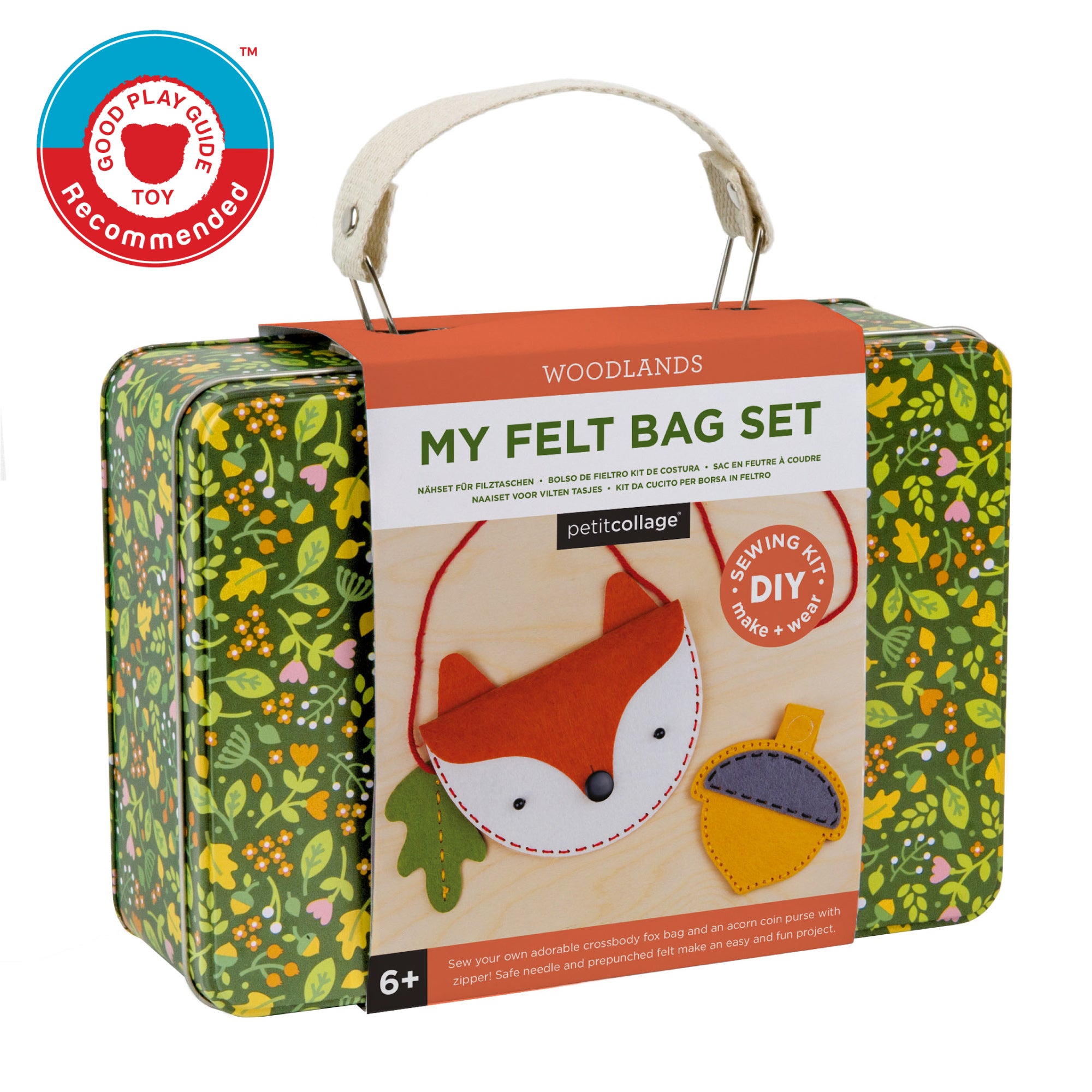 The Petit Collage DIY Woodland Fox Felt Bag is a green floral-patterned suitcase for ages 6+, featuring a fox and acorn felt craft kit, white handle, and Good Play Guide Recommended badge.