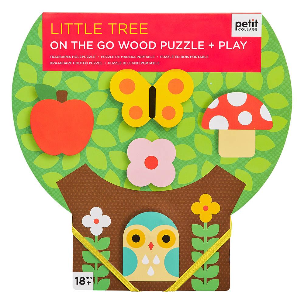 The Petit Collage Little Tree On the Go Wood Puzzle + Play is a tree-shaped wooden puzzle featuring pieces like an apple, butterfly, mushroom, and owl, designed for ages 18 months and up.