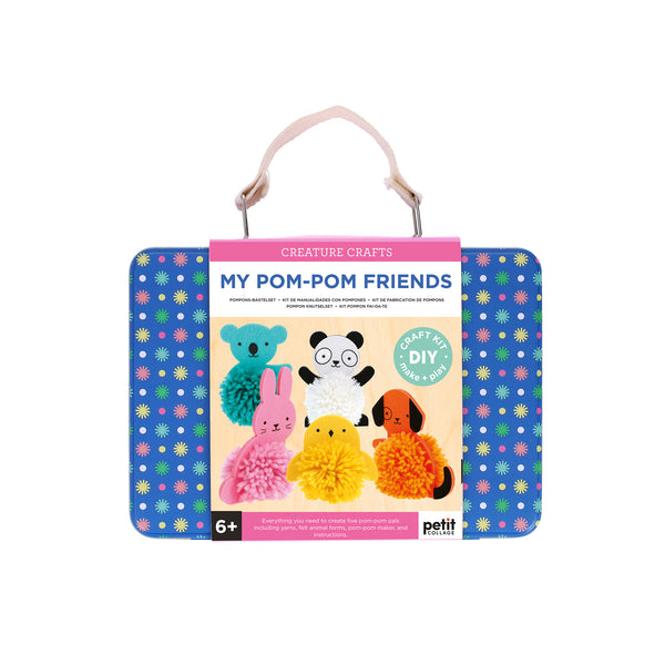 The Petit Collage Creature Crafts: My Pom-Pom Friends DIY kit comes in a blue, flower-patterned case with handle, featuring five animal pom-pom designs on the front. Suitable for ages 6 and up.