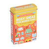 A rectangular tin from Petit Collage, Busy Ideas for Bored Kids: Rainy Day Edition, includes 50 activity cards with colorful illustrations, designed for children aged 4 and up.