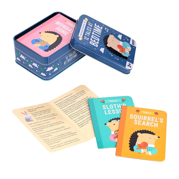 A Petit Collage tin box labeled "12 Tales at Bedtime" featuring illustrated animal story cards and an open booklet displayed in front.