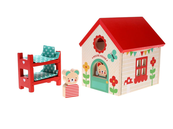 The Petit Collage Mouse House Wooden Play Set features a decorated house, a wooden toy mouse figure, and a red bunk bed with teal bedding.