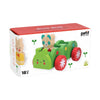 A box containing the Petit Collage Bug Bus Wooden Play Set, featuring red wheels and animal passengers, designed for ages 18 months and up.
