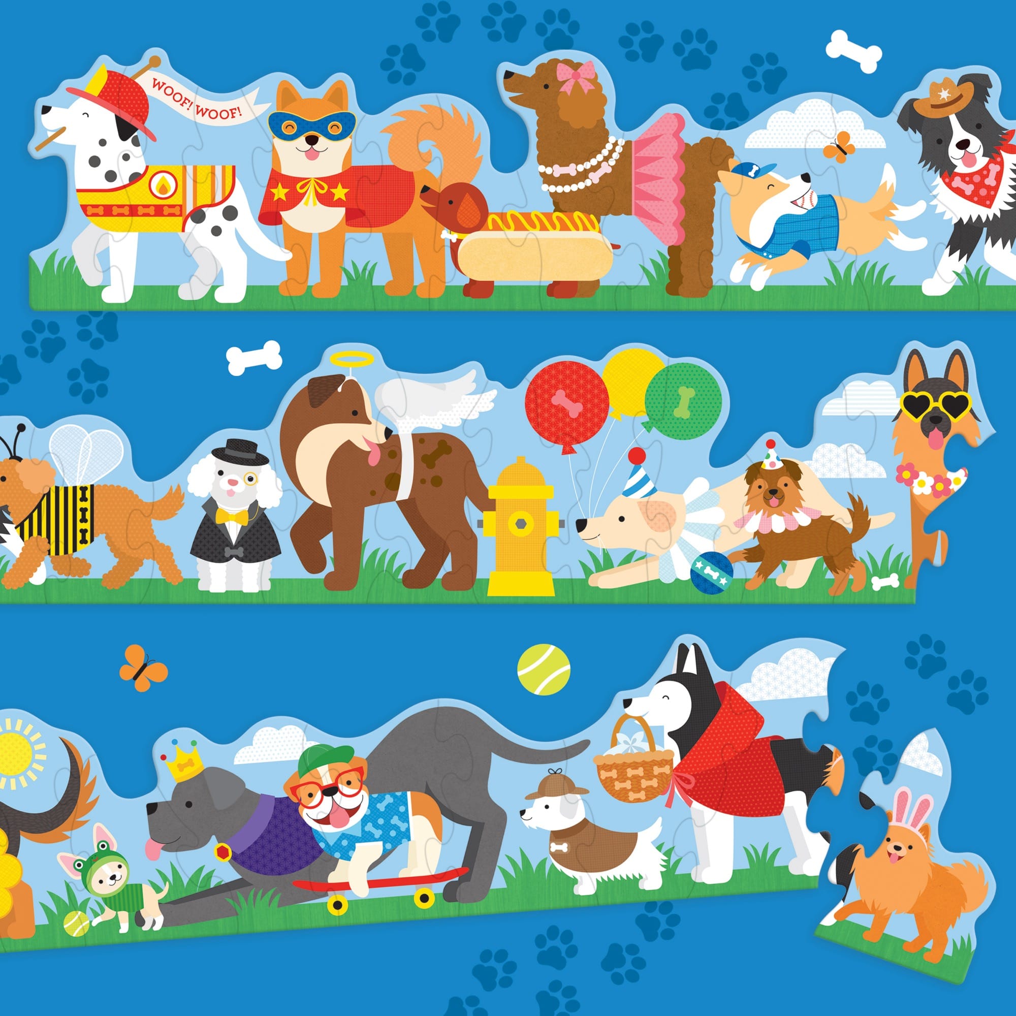 The Shaped Floor Puzzle: Dog Parade by Petit Collage features illustrations of dogs in colorful costumes—like superheroes and animals—standing in rows on a blue background with bones and paw prints.
