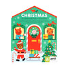 The Petit Collage Christmas Coloring Book + Stickers features animal characters, gifts, a Santa bear, and festive decorations on a house-shaped cover—perfect for kids' holiday fun.