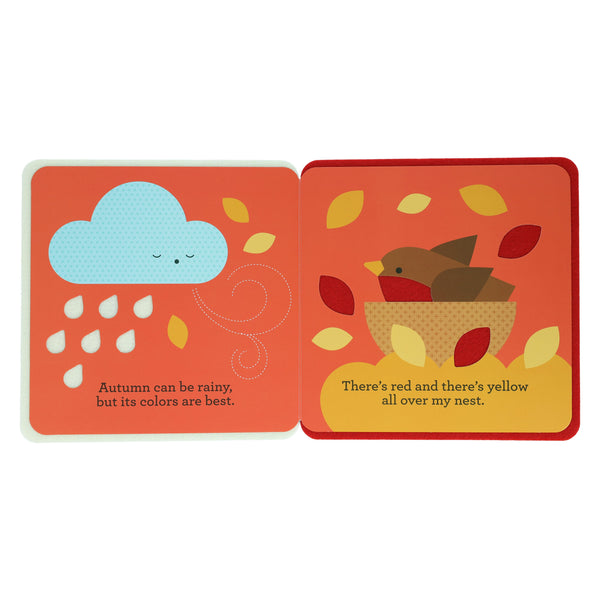 A First Felt Book: Rain and Shine by Petit Collage features an illustrated spread with a rainy cloud on the left, a bird in a nest with red and yellow leaves on the right, and text about autumn weather and colors.