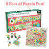 The Petit Collage Easter Parade Shaped Floor Puzzle is 6 feet long, features colorful animal and vehicle illustrations, includes box and pieces, and is designed for ages 3+.