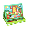 The Petit Collage Treehouse Party Magnetic Play Scene includes animal characters, picnic items, and outdoor scenery that attach to an upright board, plus extra magnetic pieces stored in the box below.