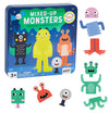 A Petit Collage Mixed Up Monsters Magnetic Play Set Tin is displayed, with six colorful, cartoon monster magnets arranged to the right of the box.