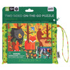 The Petit Collage Two-sided Woodland On-the-Go Puzzle, for ages 5+, comes in a green zippered pouch with animal illustrations; includes a choking hazard warning.