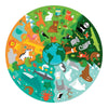 The Petit Collage Floor Puzzle: My Planet Earth features a circular illustration of animals from forest, grassland, ocean, and polar habitats encircling the Earth, with each quadrant representing a unique ecosystem.