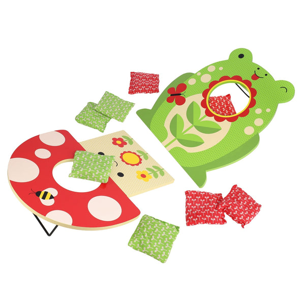 The Petit Collage Toadstool Toss Wooden Cornhole Game features red ladybug and green frog target boards, eight bean bags, and a cheerful yellow bee graphic.