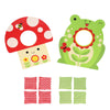 The Petit Collage Toadstool Toss Wooden Cornhole Game includes two boards—a mushroom and a frog—plus six red and six green patterned bean bags neatly arranged below them.